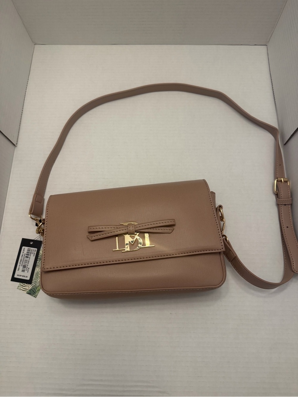 Badgley Mischka Women’s Vegan Leather Blush Purse gold hardware and bow.